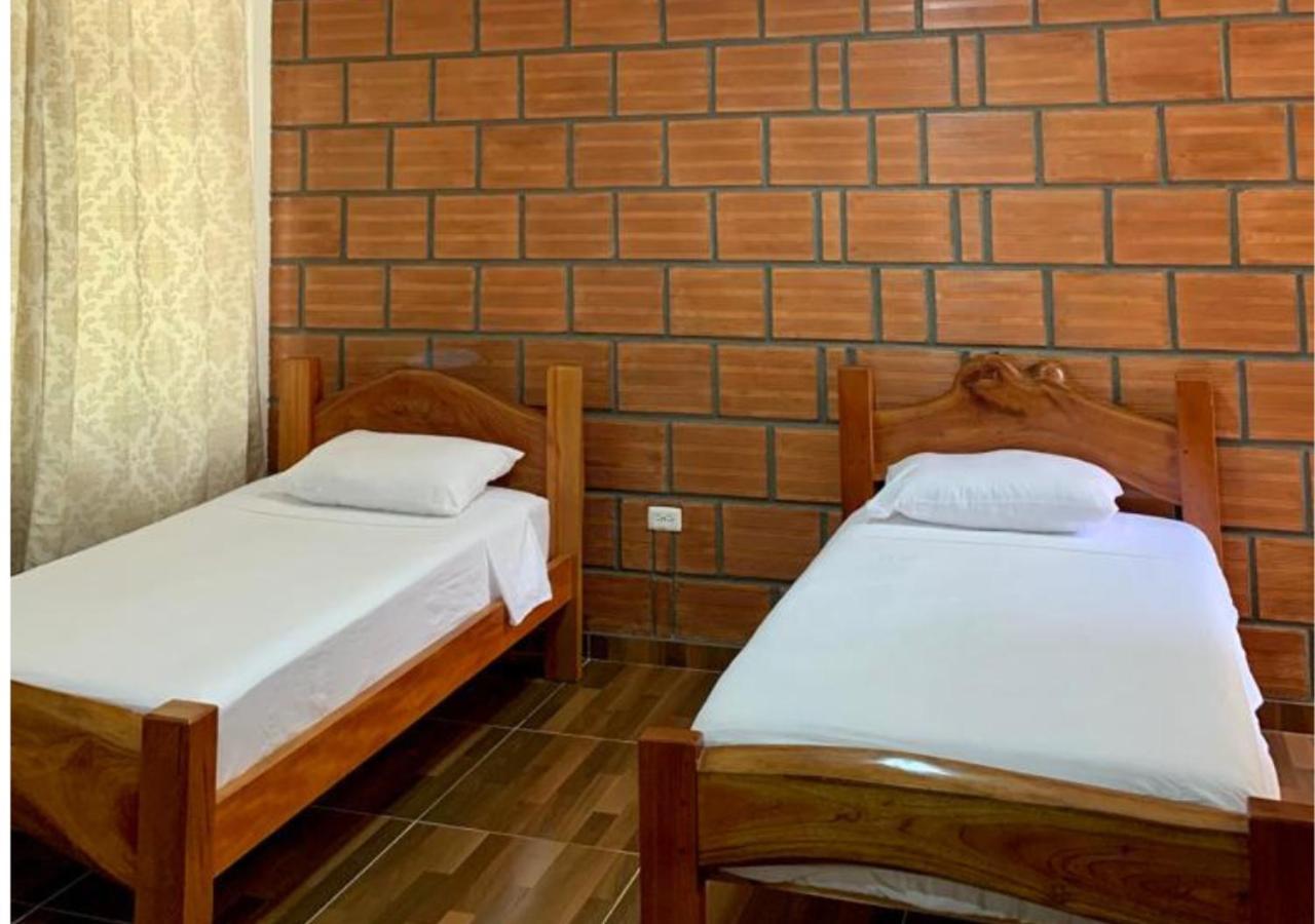 Arca Tayrona Restaurant & Hostal Los Naranjos Exterior photo